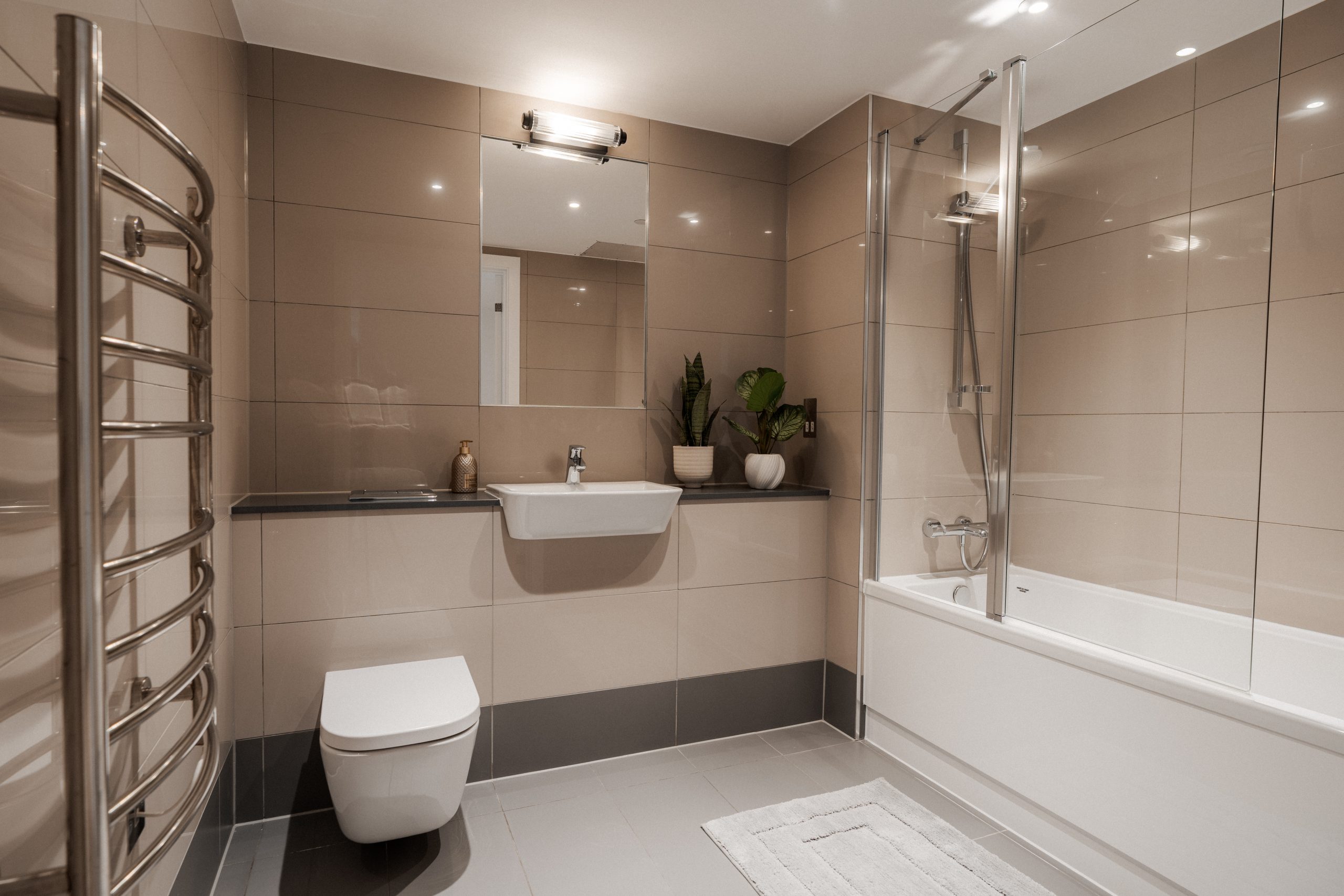 Student accommodation en-suite with bath, toilet, towel rail and sink