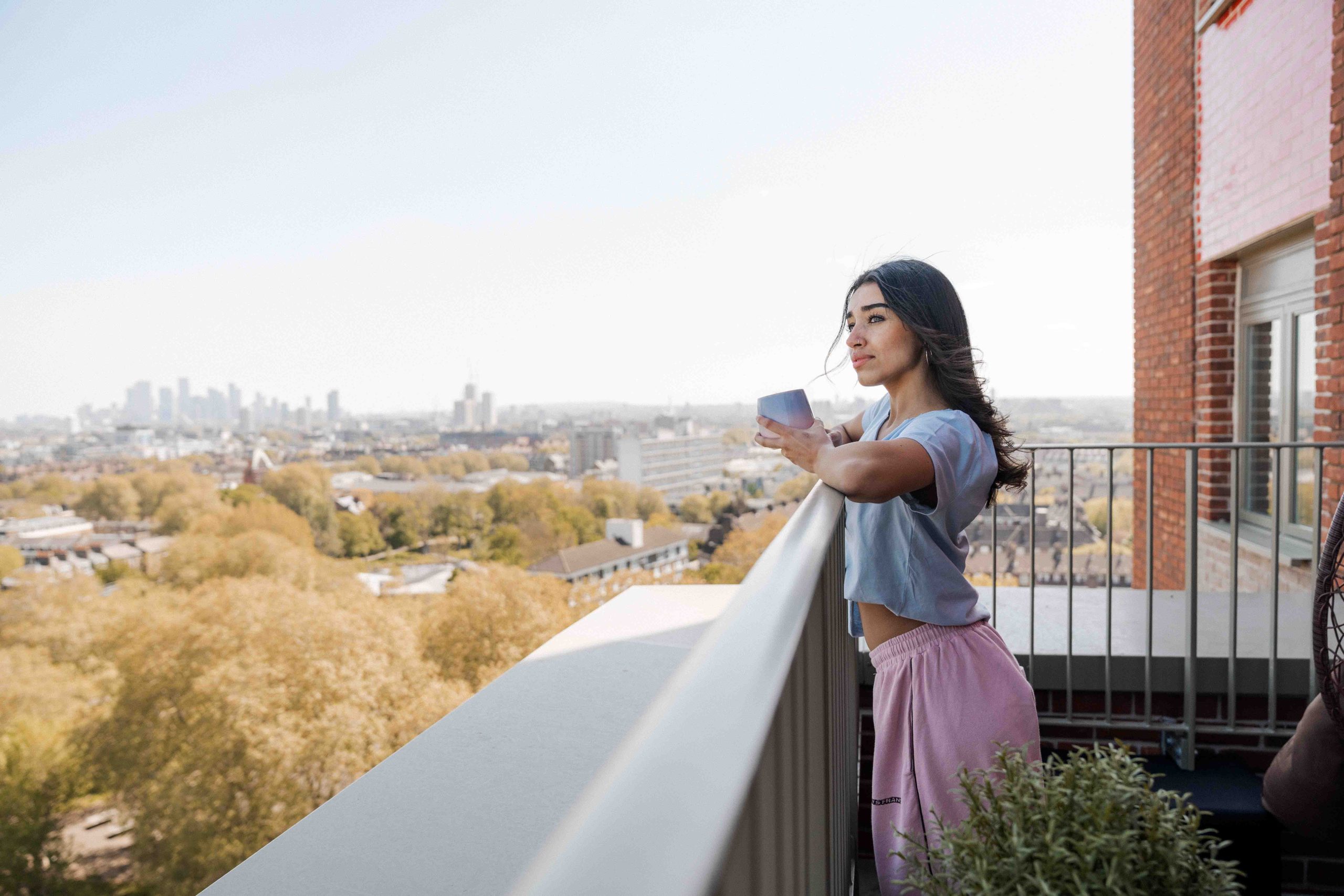 Student overlooking the London landscape