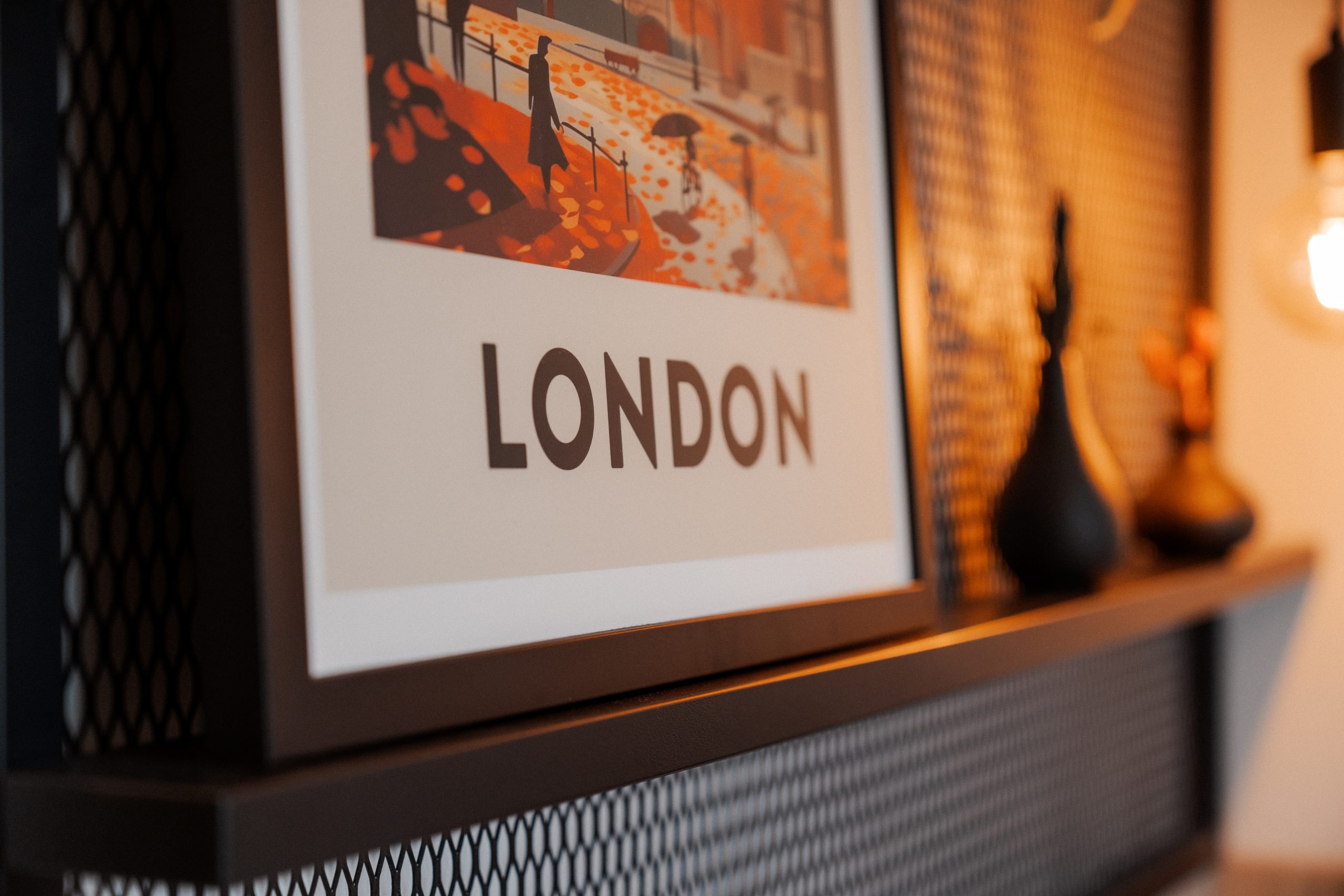 Artwork framed with 'London' shown