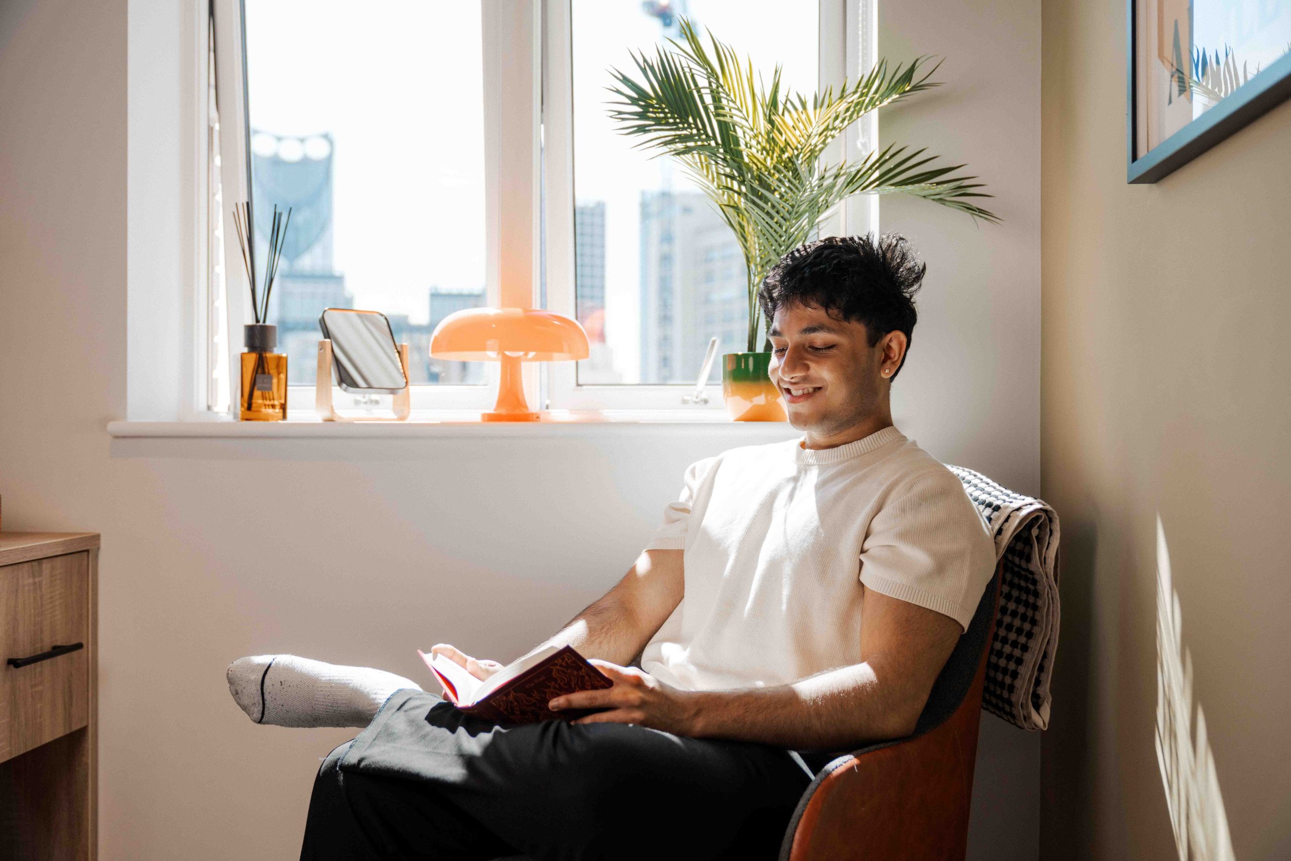 Student sat reading his book